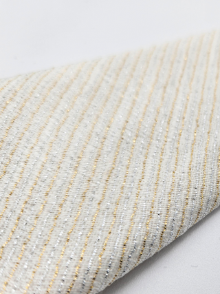 Close-up of silver and gold lurex fabric