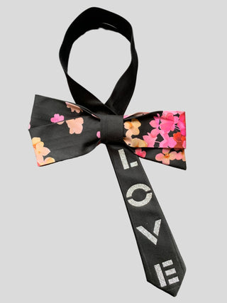 Flat image of  silver hand painted word Love on black Bow tie with floral print