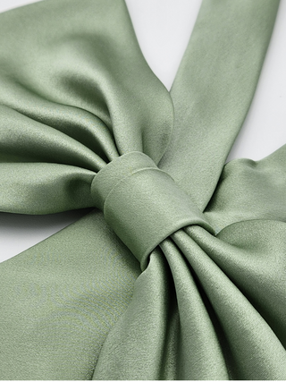 Closeup of sage green silk charmeuse bow