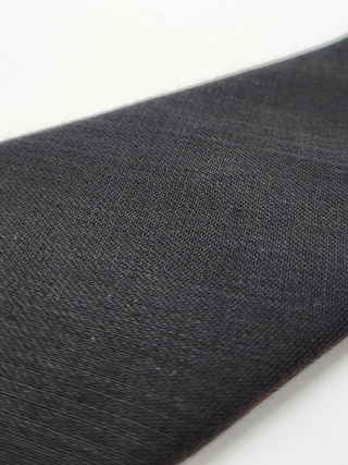 Close-up of black wool gabardine fabric