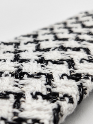 Close-up of a black and white houndstooth tweed