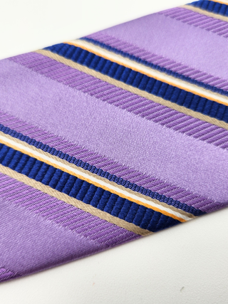 Close-up of a purple and blue tie on a white background