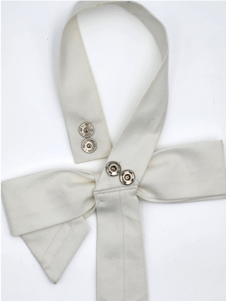 Back view of white Grace Bow Tie with nickel snaps