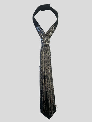 Flat view of black tie with silver beading, crystal rhinestones and sequins that fringe at the bottom.