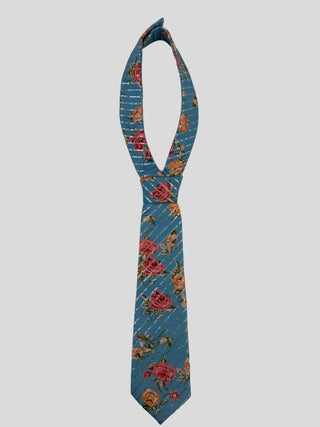 Flat image of blue petite necktie with pink roses and silver lurex stripes.