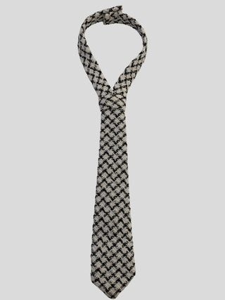 Flat image of a black and white houndstooth tweed classic tie